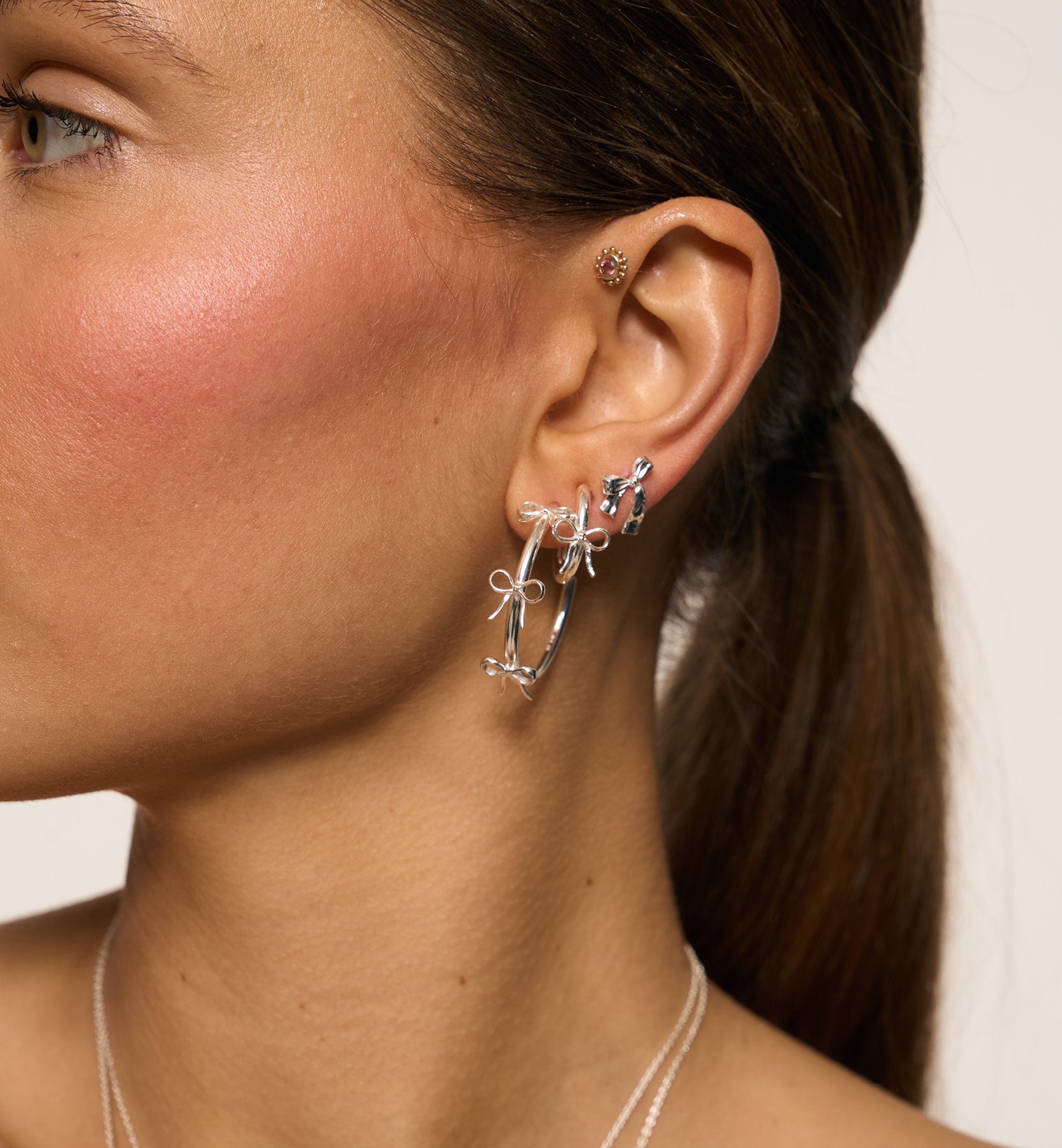 Grote strik oorringen - zilver