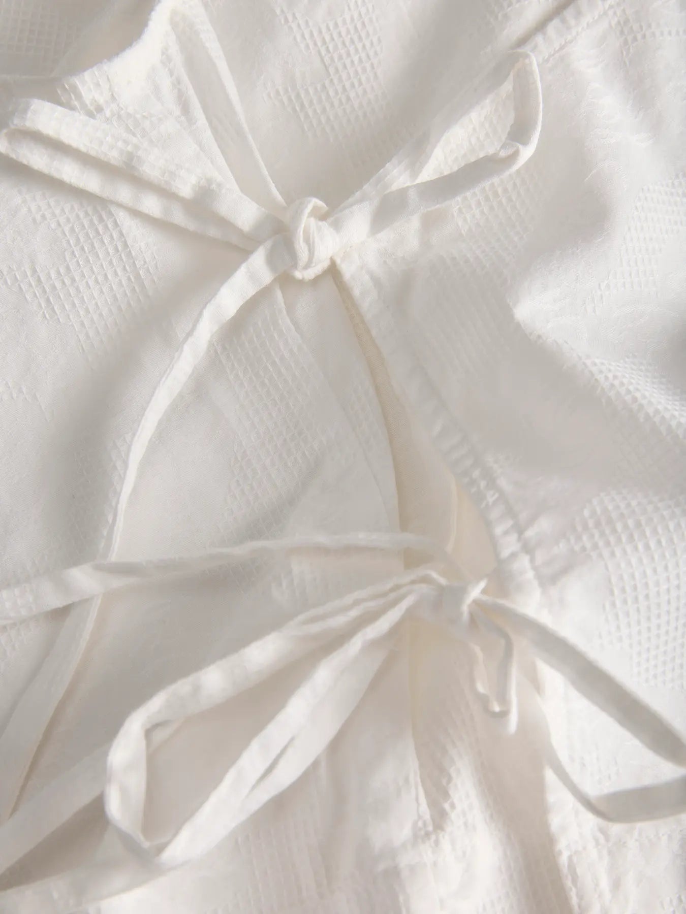 JXALIA STRUCTURED WRAP TOP - BLANC DE BLANC