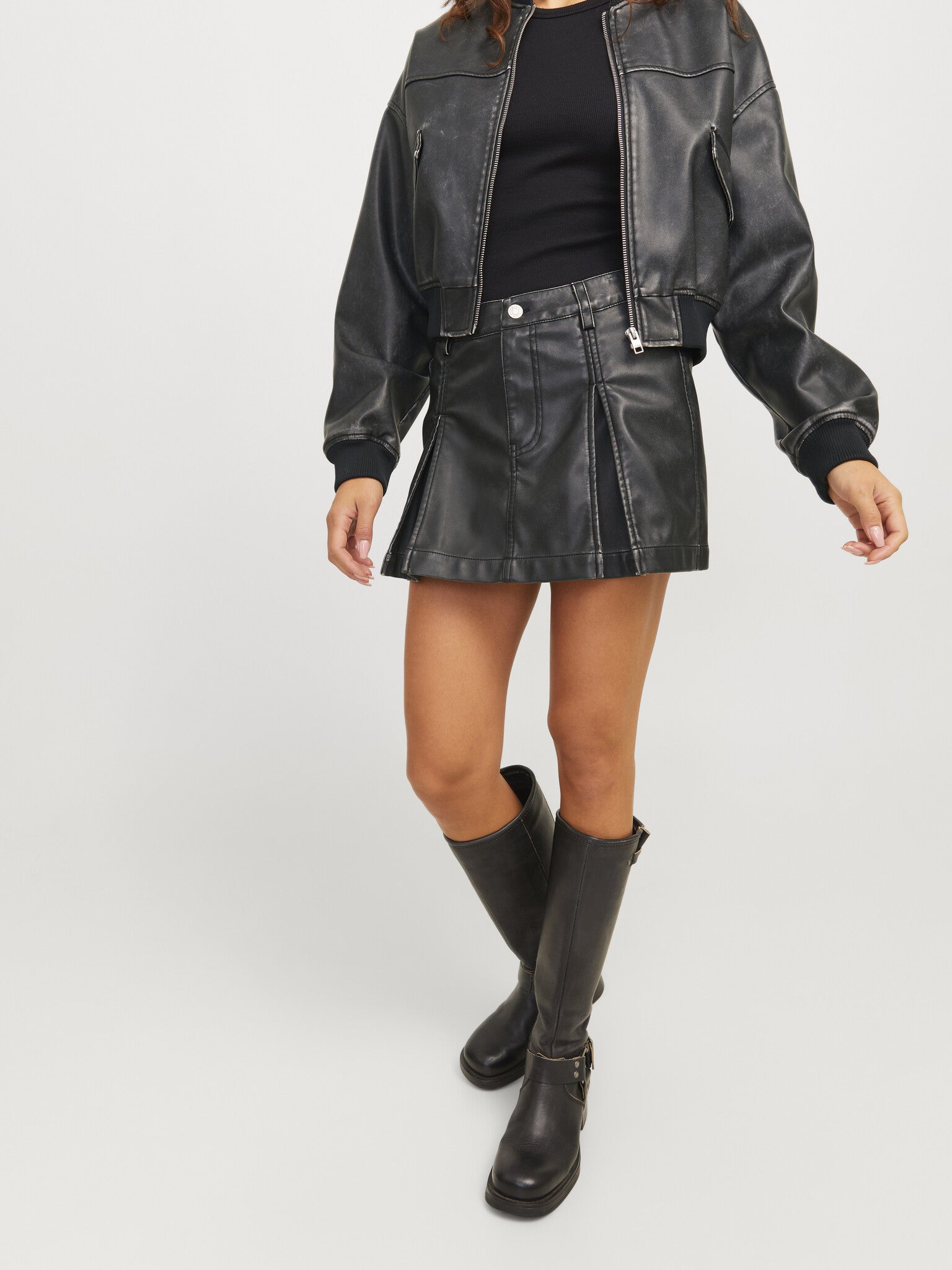 JXTORA GEPLOOIDE ROK MET WASSEN UITSTRALING - ZWART